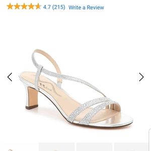 Shoes. Worn for one occasion.  Has small blemish o